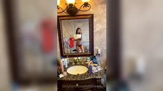 Katie Bell Gorgeous prostitute caresses pussy in the forest