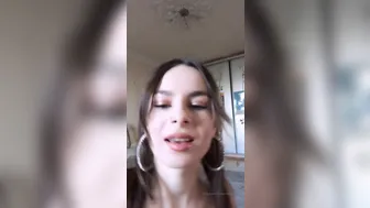 Alina, Emily Poker Black-haired young lady in stockings masturbates her shaved pussy